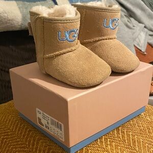 UGG Kids Tan Boots with Blue Logo in good condition worn only once